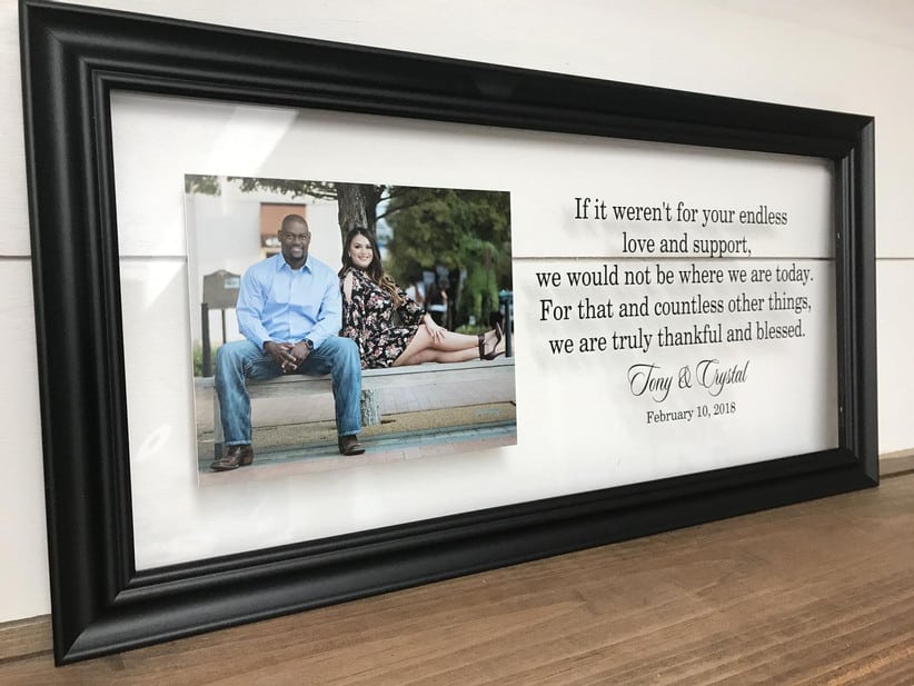 Framed message with a photo of a man and woman sitting together.